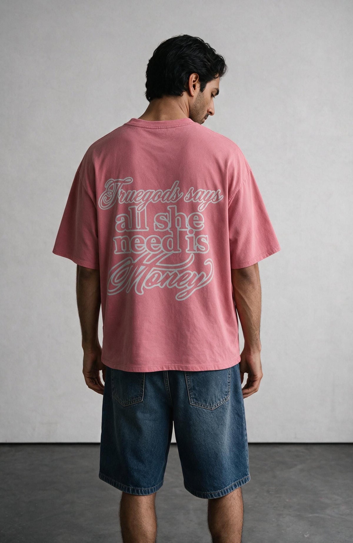 All She Need Is Money oversized T-shirt by Truegods – on model, studio