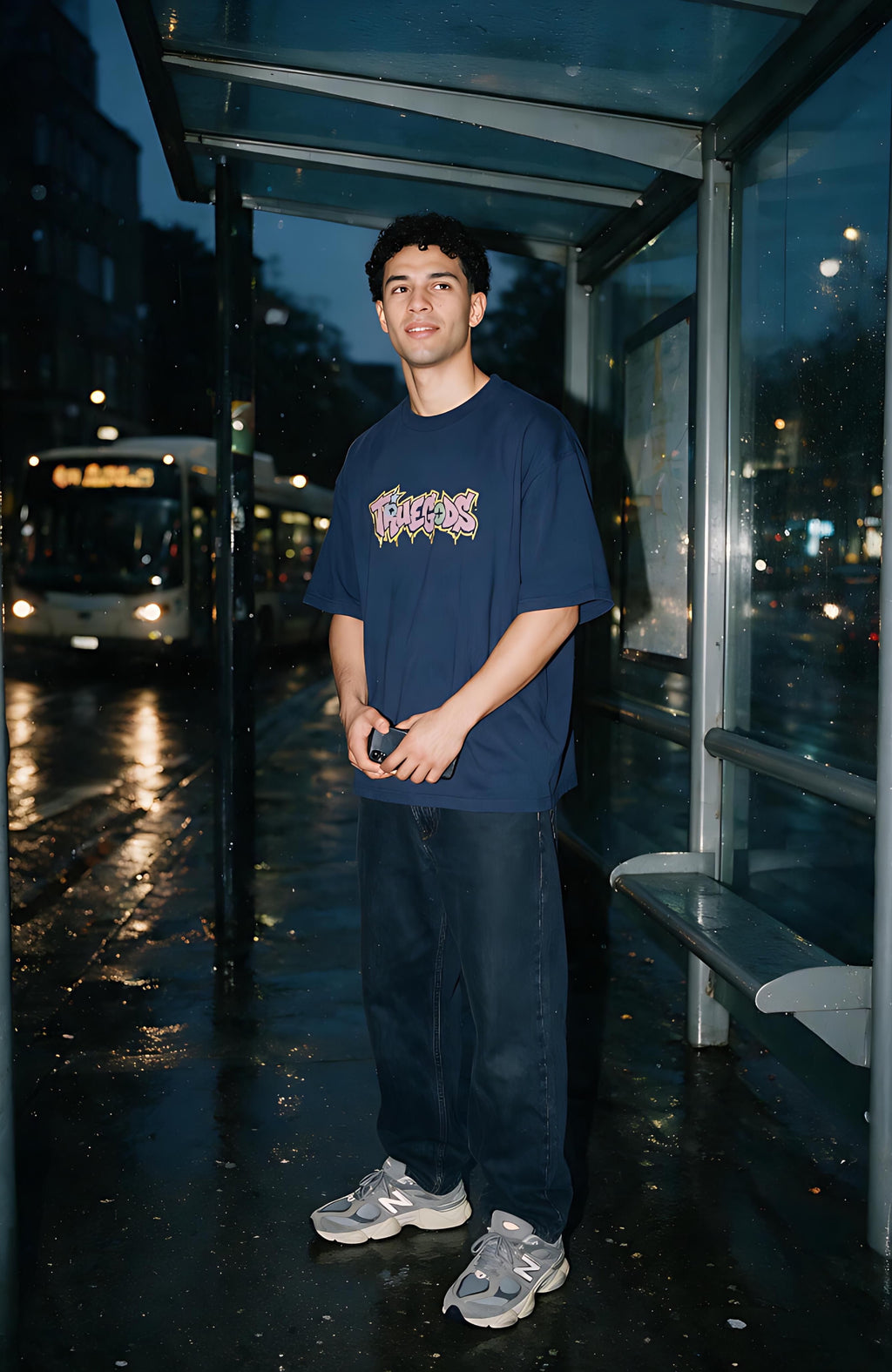 Electric Logo oversized T-shirt by Truegods – lifestyle, bus stop