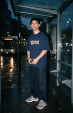 Electric Logo oversized T-shirt by Truegods – lifestyle, bus stop