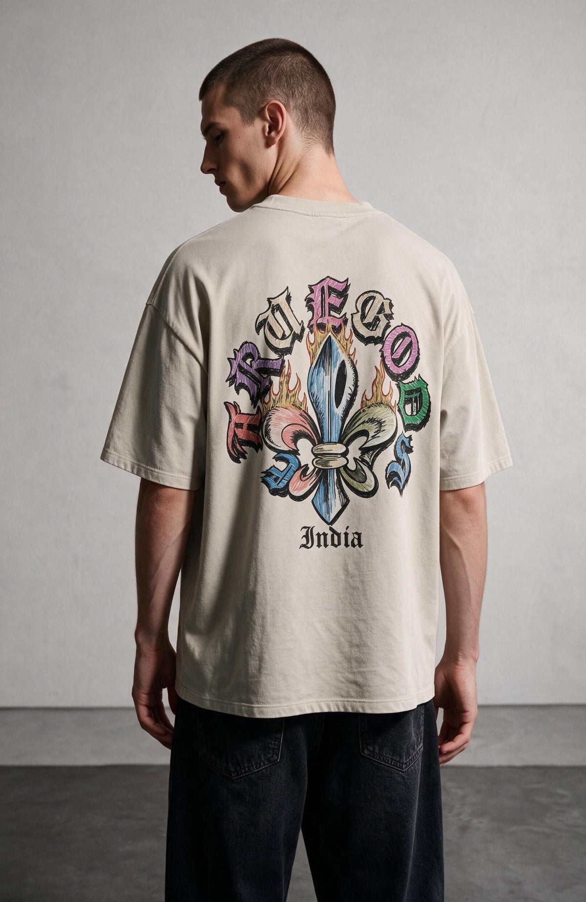 Fleur Crest oversized T-shirt by Truegods – on model, studio